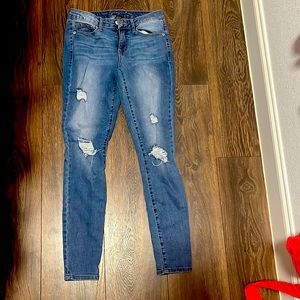 Ripped blue skinny jeans